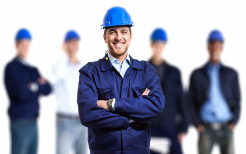 Happy-group-engineers_hardhat_AdobeStock_44636755