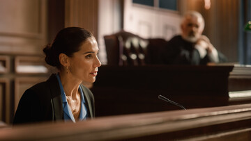 professional female expert witness testifying in court