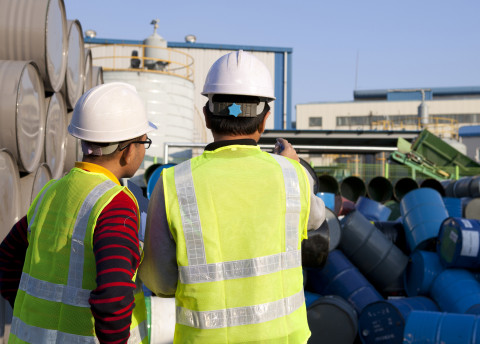 Inspectors-hazmat-barrels_Fotolia_59570801_M