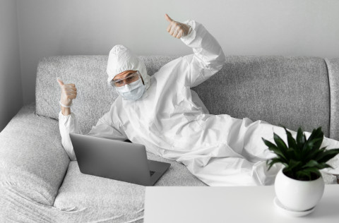 Hazmat-Man-Sofa-Thumbs-Up_AdobeStock_345641101