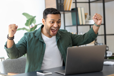 Excited-Man-Celebrating-Achievement_AdobeStock_436526841