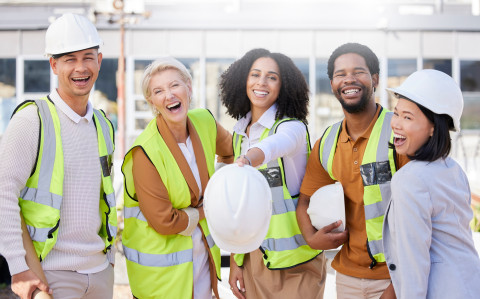 Happy-workers-hardhats_AdobeStock_637949464